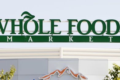 The sign for the Whole Foods grocery store is seen in Lakewood