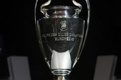 The Champions League trophy is seen during the draw ceremony for the Champions League group stage at Monaco's Grimaldi Forum in Monte Carlo.