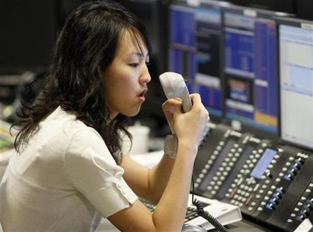 A trader in inflation swaps works at BGC Partner's offices in Canary Wharf in London
