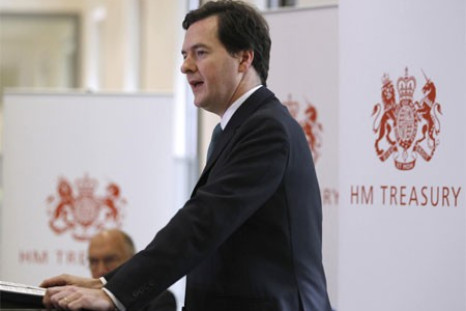 Chancellor George Osborne, arrives to speak at a news conference at the Treasury, in central London