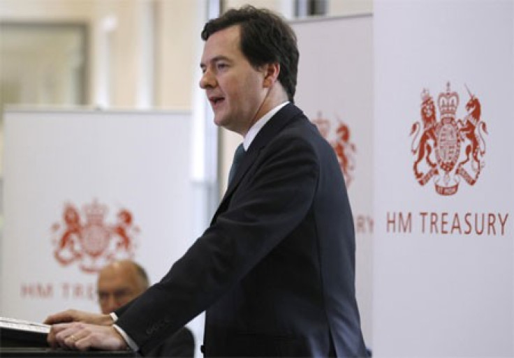 Chancellor George Osborne, arrives to speak at a news conference at the Treasury, in central London