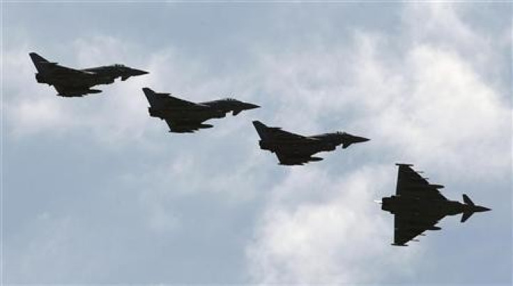 Four Italian Air Force Eurofighter EF-2000 Typhoon fly over the Birgi NATO Airbase in Trapani