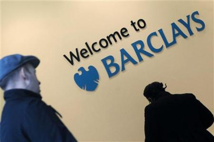 Customers enter a branch of Barclays bank in the City of London