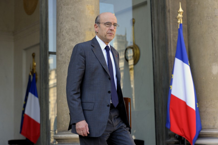 France's Foreign Affairs Minister Juppe leaves the Elysee Palace in Paris