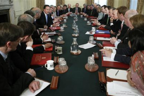 Prime Minister David Cameron leads his first cabinet meeting at number 10 Downing Street in London