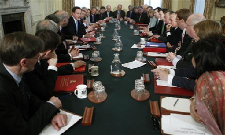 Prime Minister David Cameron leads his first cabinet meeting at number 10 Downing Street in London