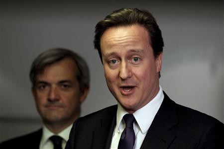 Britain's Prime Minister David Cameron speaks to staff during a visit to the Department Of Energy and Climate Change in London