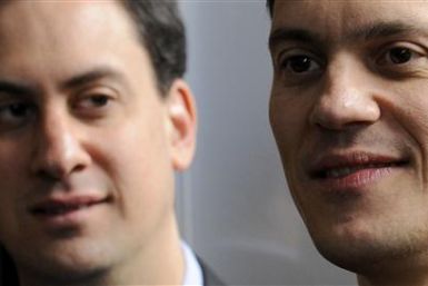 File photo of Miliband brothers at the unveiling of an election poster-van design at Basildon