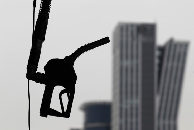 A gasoline pump is seen hanging at a petrol station in central Seoul