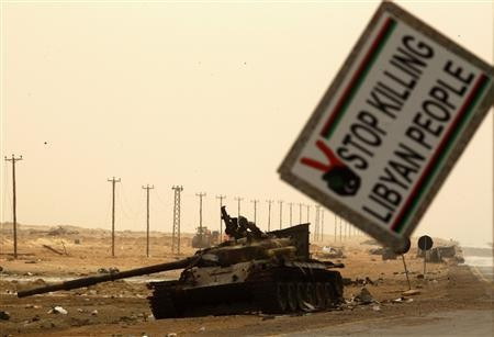 A Gaddafi forces tank, destroyed by NATO air strikes A Gaddafi forces tank, destroyed by NATO air strikes