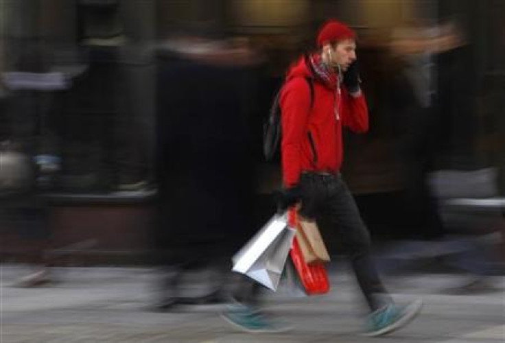 A shopper walks down a street in London