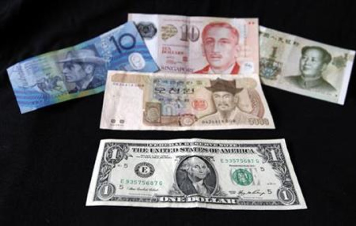 A US dollar note is pictured alongside other currencies in this picture illustration taken in Washington A US dollar note is pictured alongside other currencies in this picture illustration taken in Washington