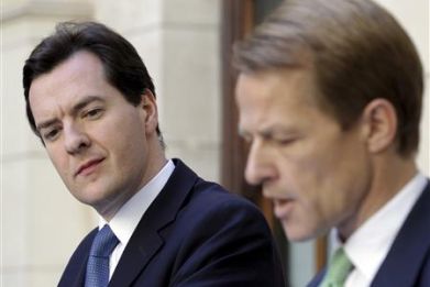 Chancellor George Osborne, and Chief Secretary to the Treasury, Laws, attend a news conference in central London