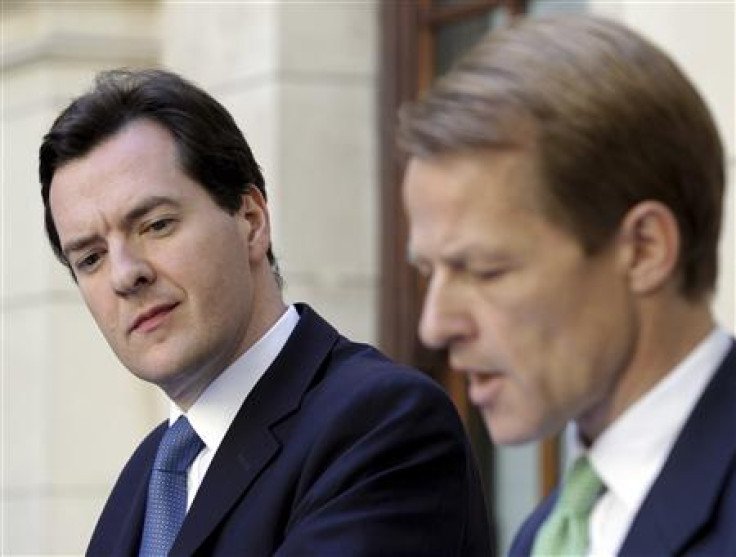 Chancellor George Osborne, and Chief Secretary to the Treasury, Laws, attend a news conference in central London