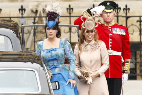 Britain's Princess Eugenie and Princess Beatrice arrive at Westminster Abbey before the wedding of Britain's Prince William and Kate Middleton.