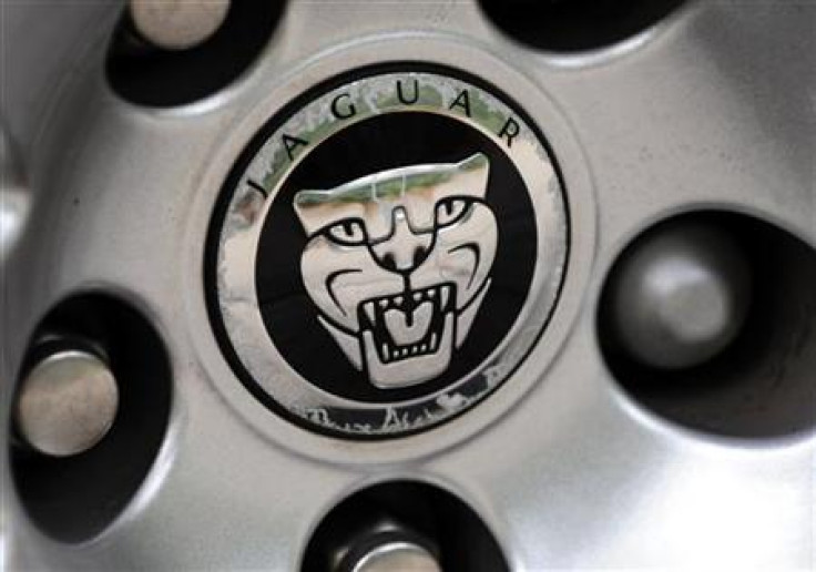 A Jaguar car logo is seen on a vehicle hubcap in central London