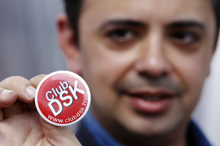 A supporter of Dominique Strauss-Kahn shows a badge during the summer meeting of the French Socialist Party in La Rochelle.