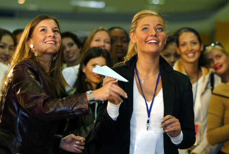 Imogen Thomas, left, pictured in 2003 at the Miss World beauty pageant in Shanghai