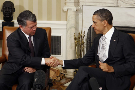 U.S. President Barack Obama shakes hands with Jordan's King Abdullah after a private meeting in Washington