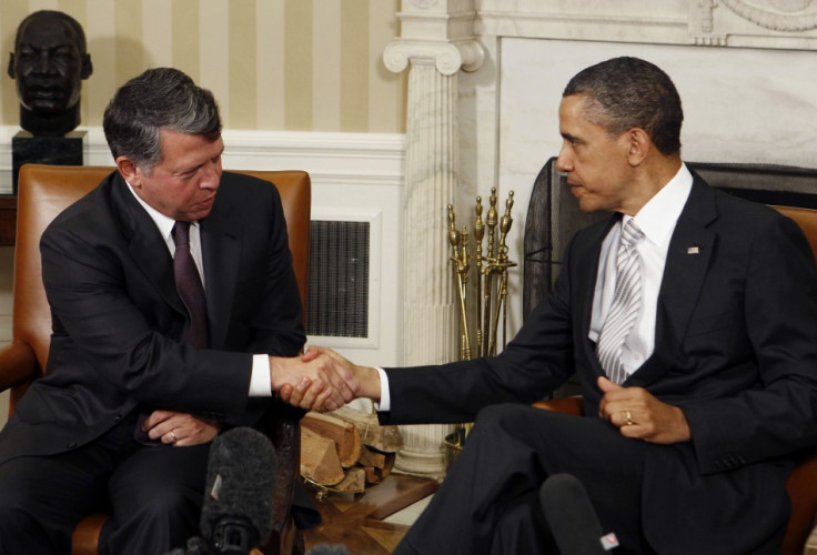 U.S. President Barack Obama shakes hands with Jordan's King Abdullah after a private meeting in Washington