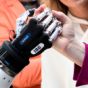 German Chancellor Angela Merkel shakes hands with a humanoid robot German Chancellor Angela Merkel shakes hands with a humanoid robot